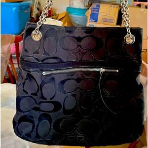 Black Coach shoulder bag with metal straps